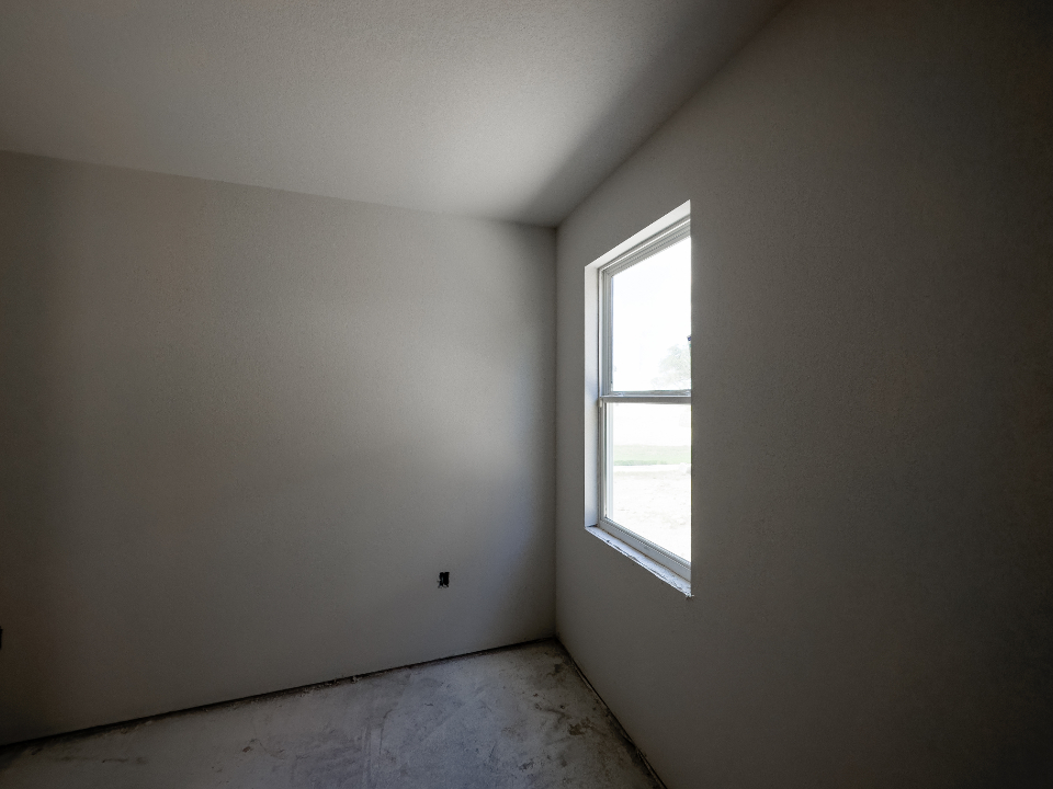 Habitación con las paredes lisas recién terminadas